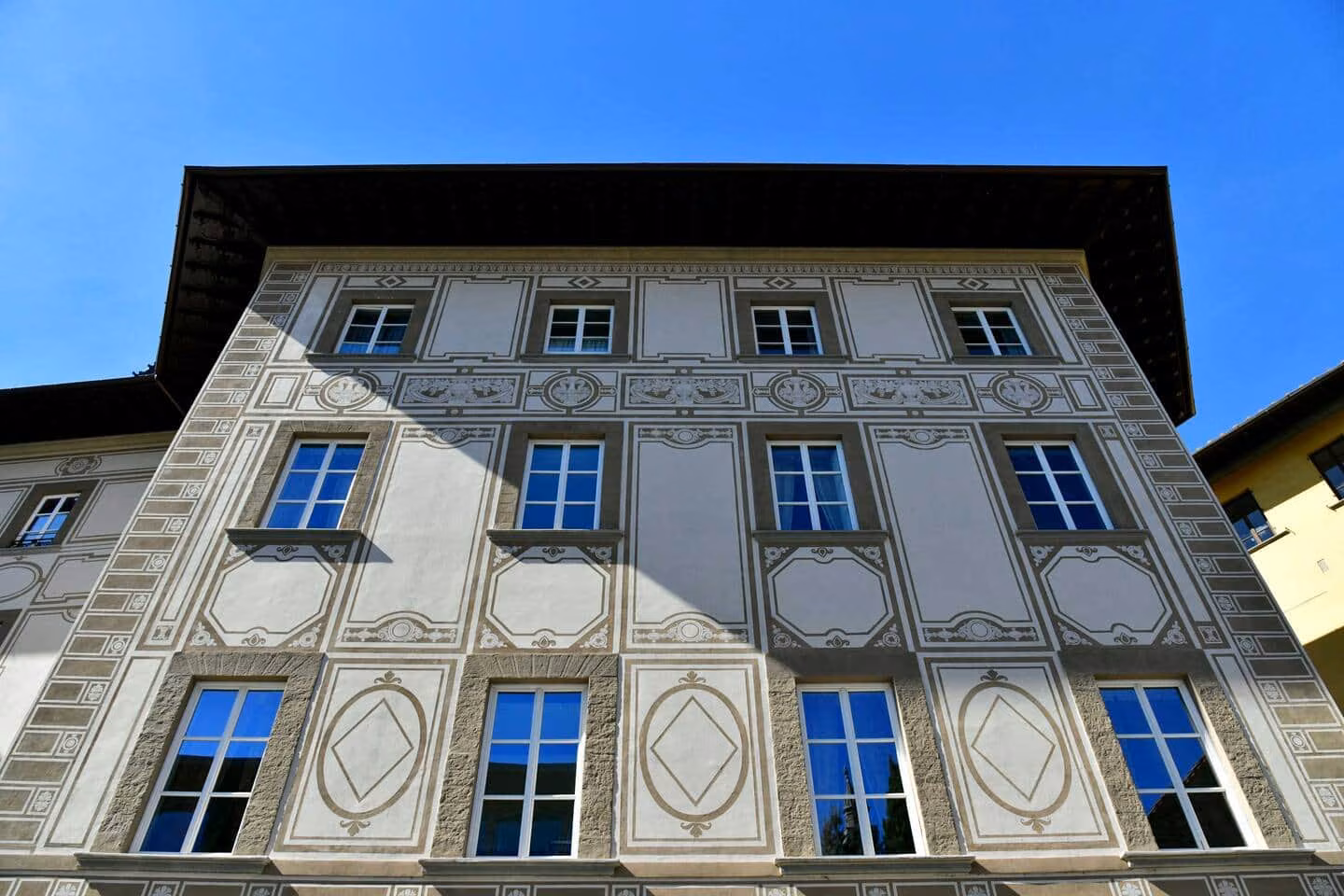 Historic Florentine palazzo facade at dusk — La Croce D'Oro